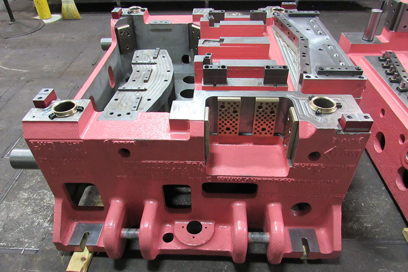 Cast die set components and machined tooling.