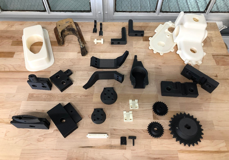 3D printed parts showcase image paired with the additive manufacturing capability.