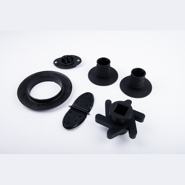Industrial Products21 image showing a selection of black molded rubber components.