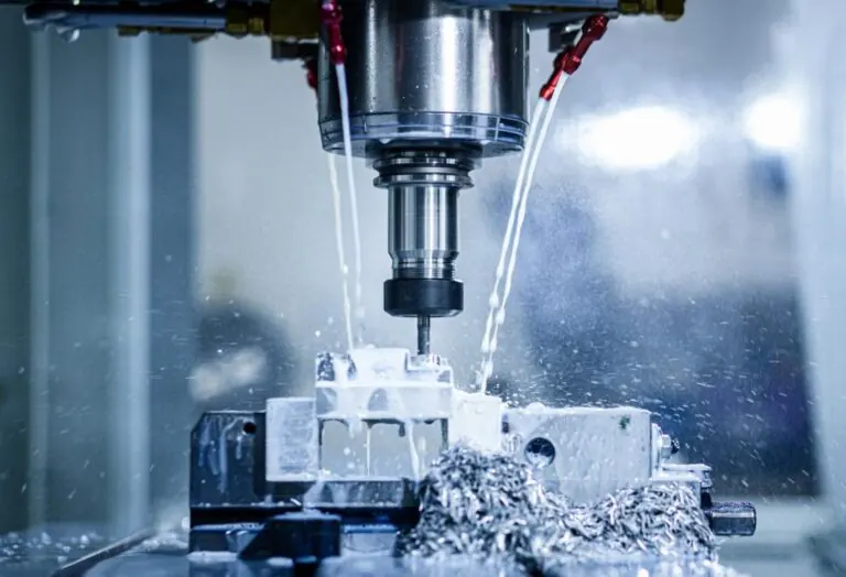 CNC milling with high-pressure coolant and carbide end mills.
