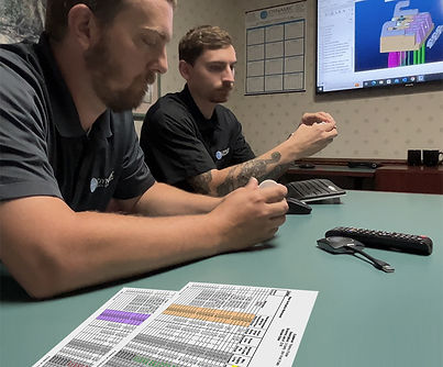 Capabilities page image showing injection mold design review.