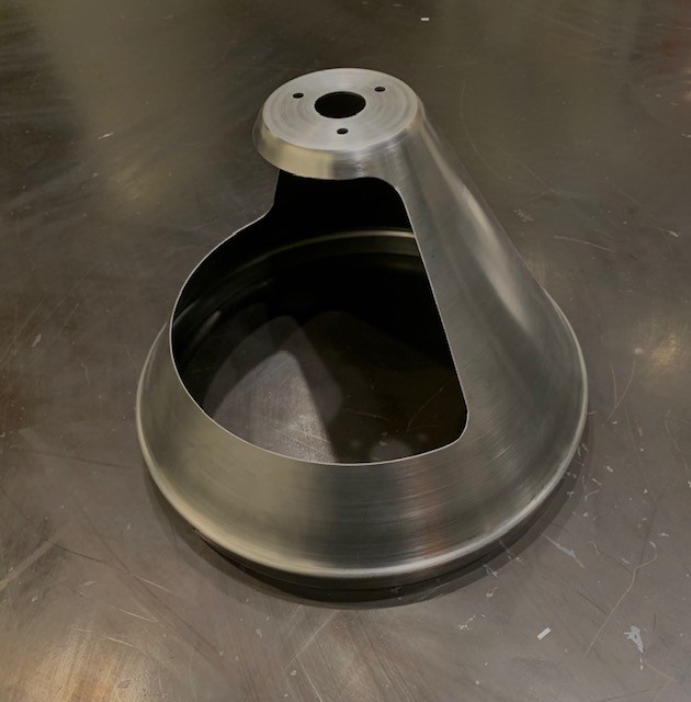 Steel cone produced through the CNC roll forming service.