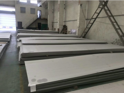 Workshop image used on the company's sheet-metal processing page.