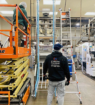 Industrial maintenance team supporting production equipment.