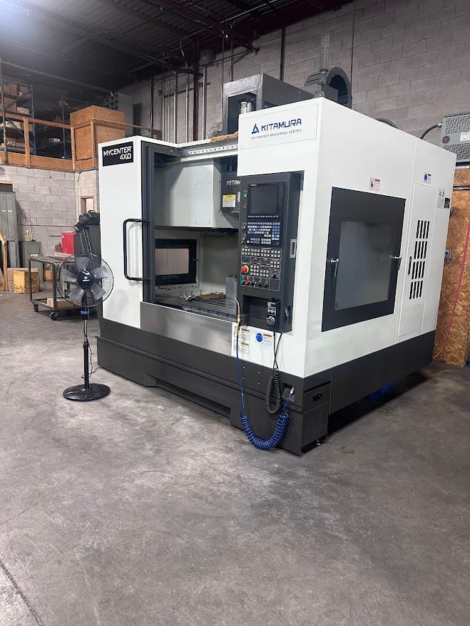 CNC milling equipment shown in the machining gallery.