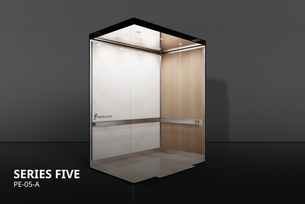 Designer Series 5A elevator cab interior with white chevron porcelain, light wood laminate panels, stainless steel handrail, and LED pot lights.