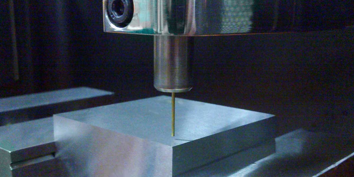 Small-hole EDM equipment shown on South Shore Manufacturing's official capability page.