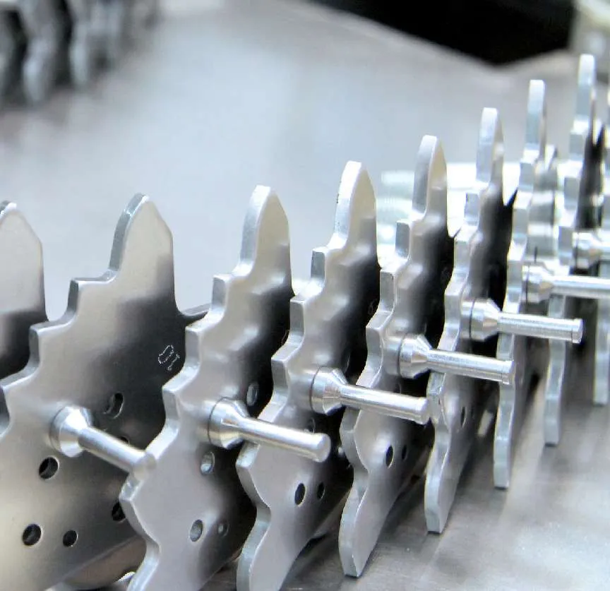 Precision-stamped stainless sprocket blanks with clean shear edges.