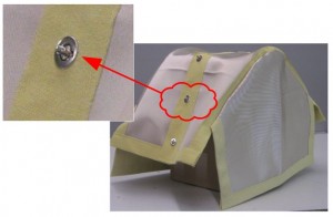 High-temperature trolley skirt with quarter-turn fasteners.